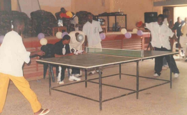 Young people playing table tennis at an early LHI youth event
