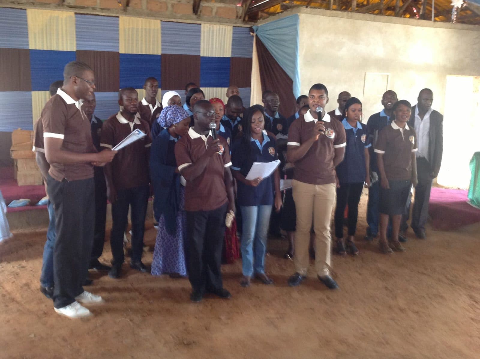 Life Helpers staff singing together at the 10-year staff retreat