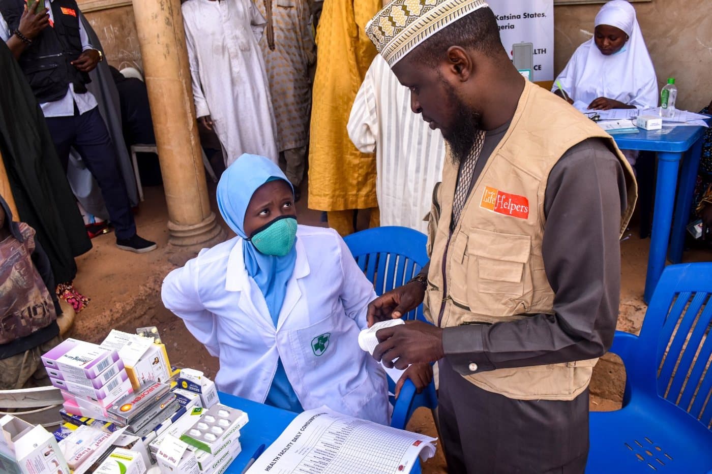 LHI staff member and a health worker at an integrated health clinic