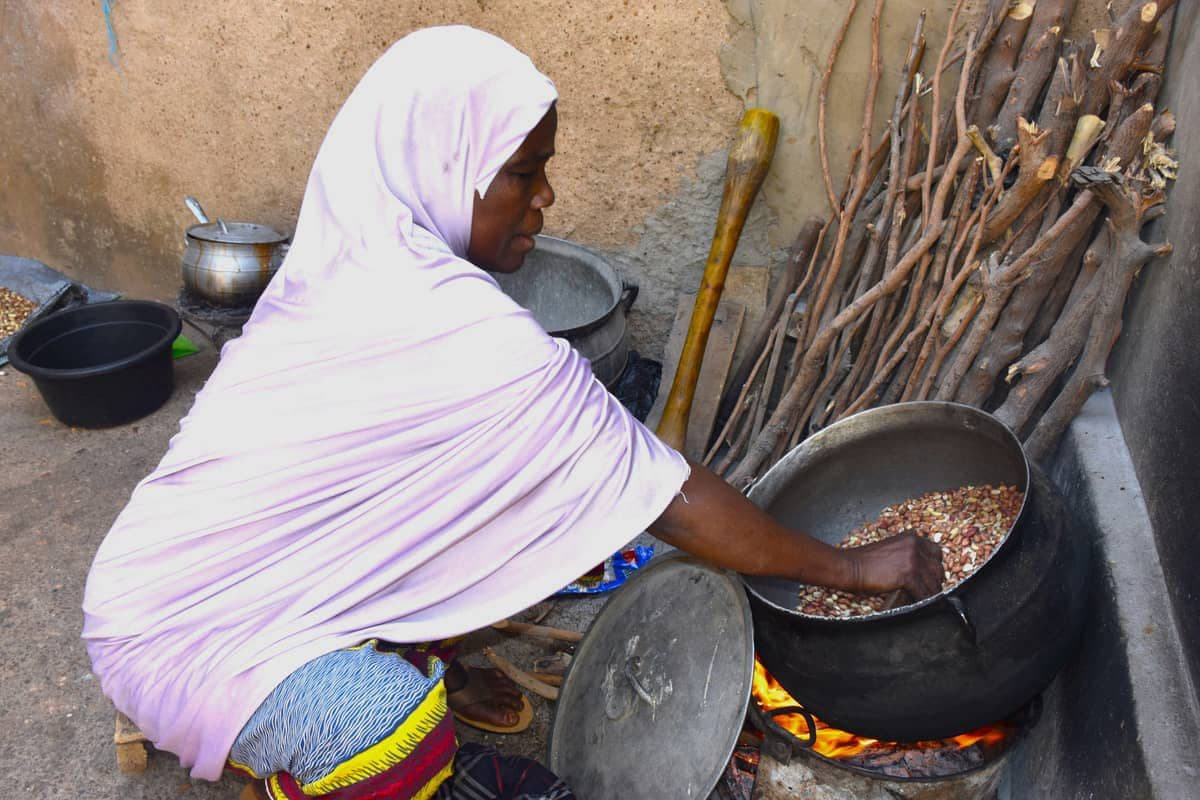 Woman preparing food in her outdoor kitchen