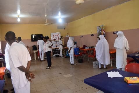 Health workers at an LHI health awareness and training session in a hall